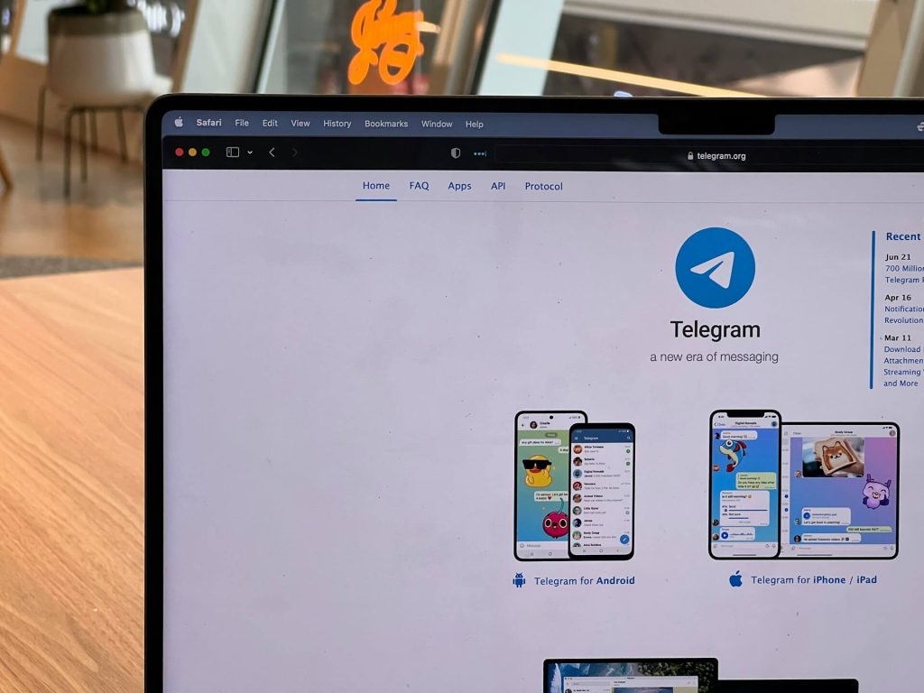 Laptop showing telegram app on screen